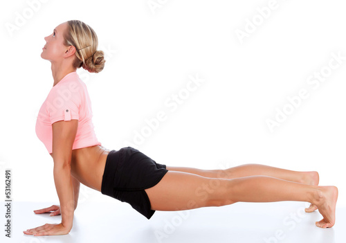 Wallpaper Mural woman doing fitness exercise, white background, copyspace Torontodigital.ca