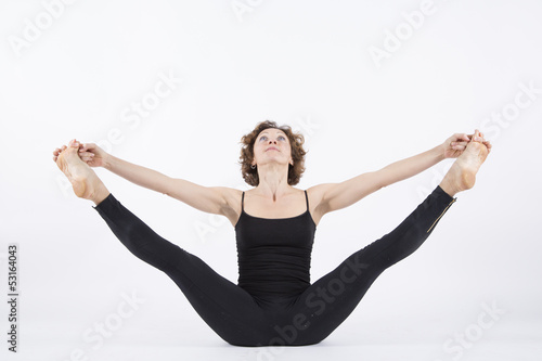 yoga posture upavishtha konasana B seated angle pose front view photo