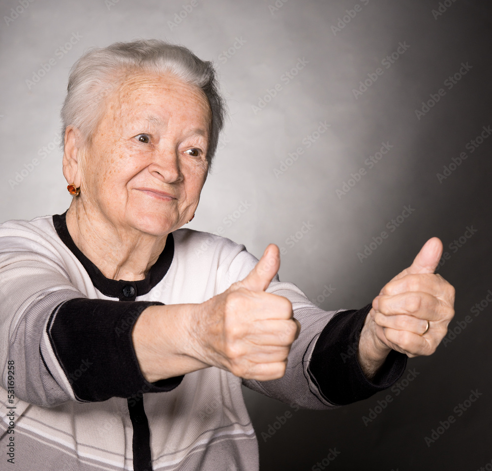 Old woman showing ok sign Old woman showing ok sign