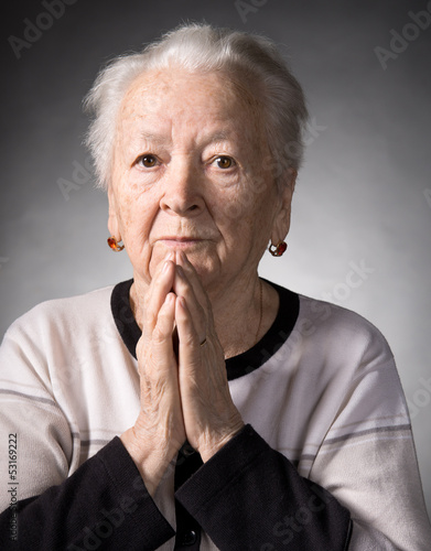 Old woman praying