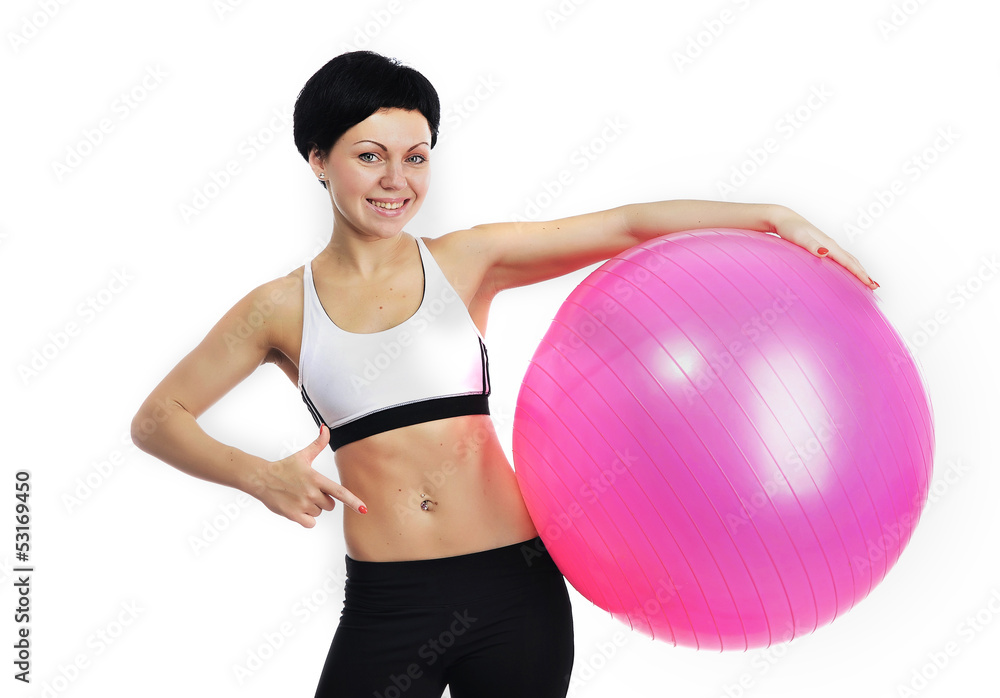 Young woman with a fitness ball Young woman with a fitness ball