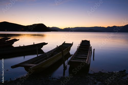 wooden boats in the Lugu lake