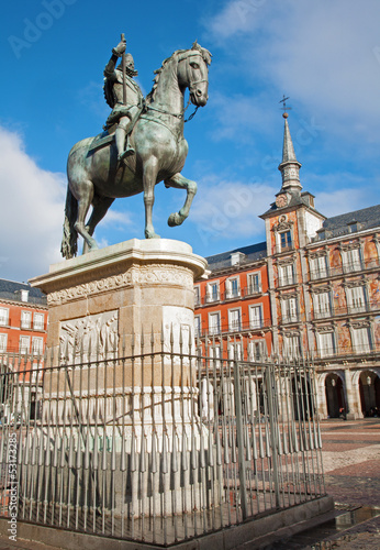 Madrid - Plaza Mayor in morning and statue of Philips III