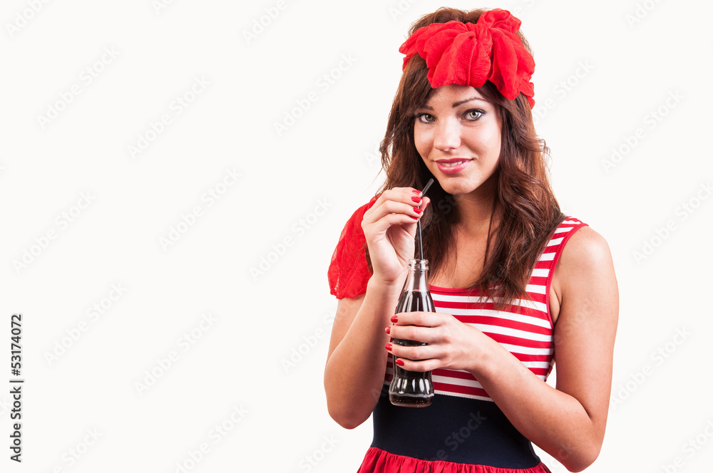 a young beautiful girl old-fashioned, drink soda through a straw a young beautiful girl old-fashioned, drink soda through a straw