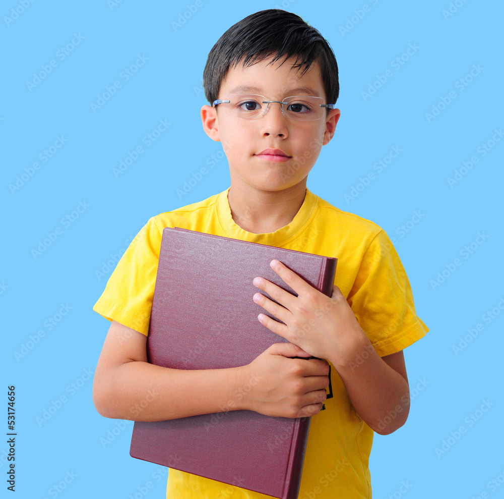 Obraz premium Boy Holding a Thick Red Book