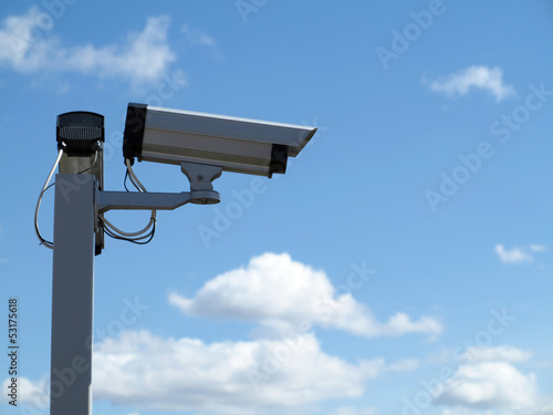 Security camera cctv over blue sky