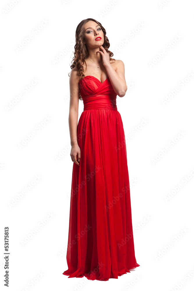 Beautiful female fashion model posing in red dress Beautiful female fashion model posing in red dress