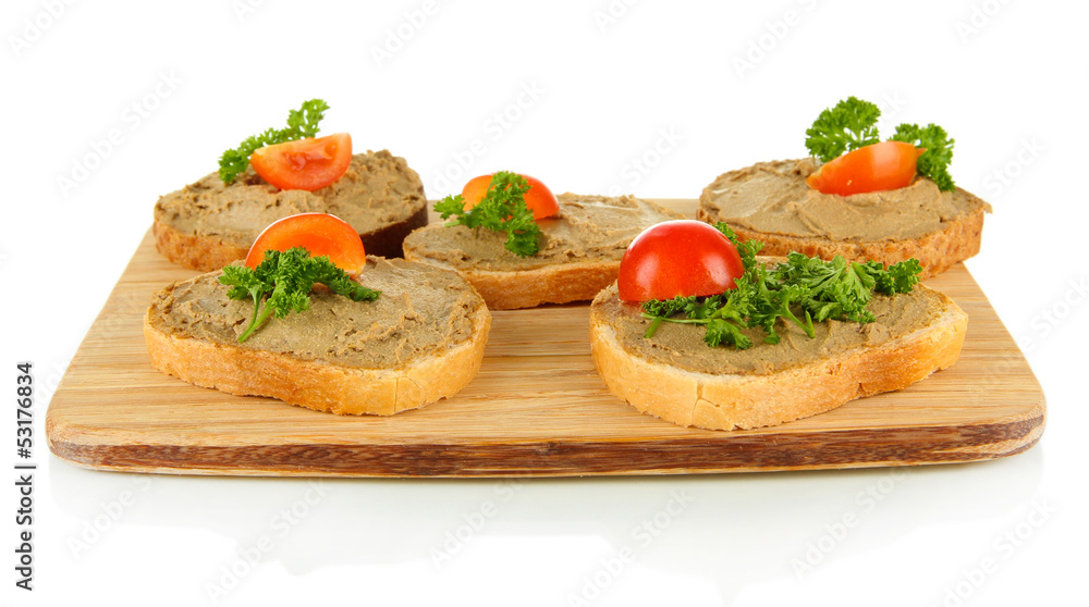 Fresh pate on bread on wooden board, isolated on white