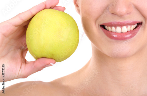 Smiling woman with apple close up