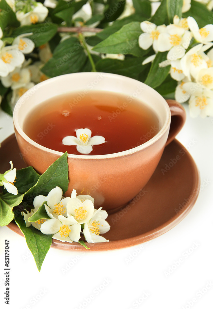 Cup of tea with jasmine, isolated on white Cup of tea with jasmine, isolated on white