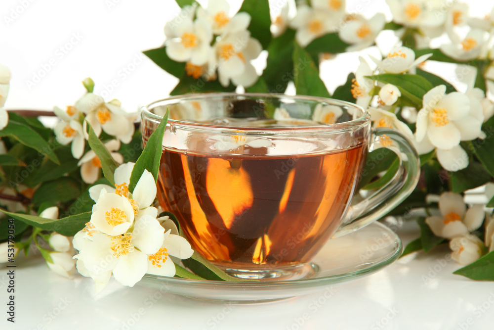 Cup of tea with jasmine, isolated on white Cup of tea with jasmine, isolated on white