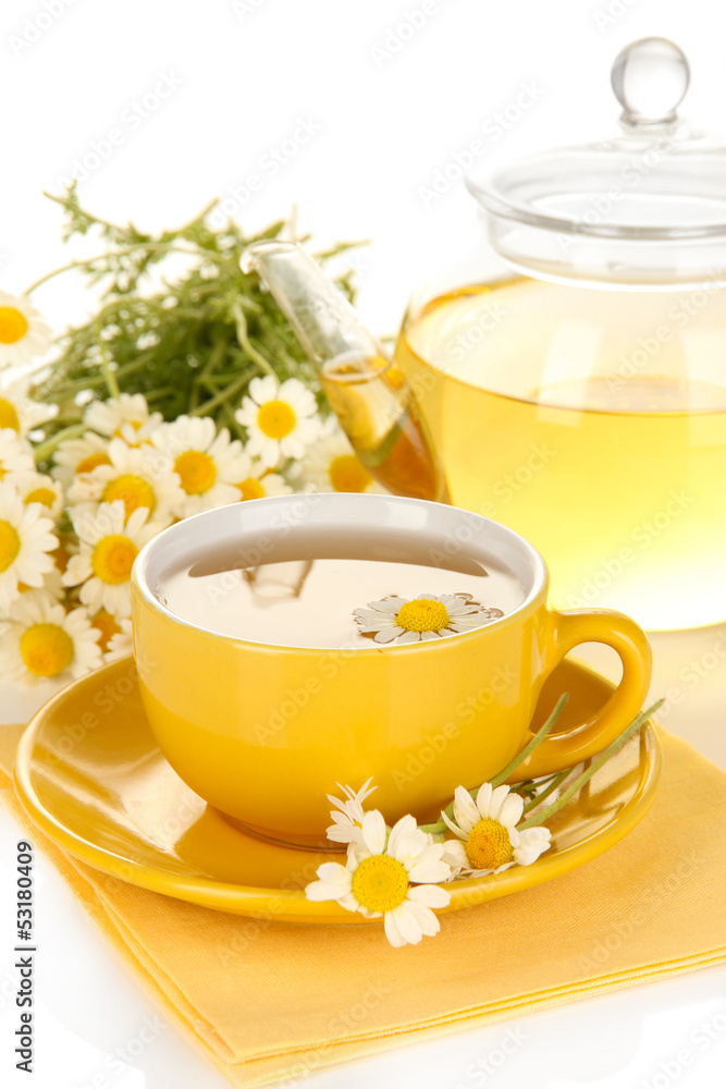 Cup of herbal tea with camomiles close up Cup of herbal tea with camomiles close up