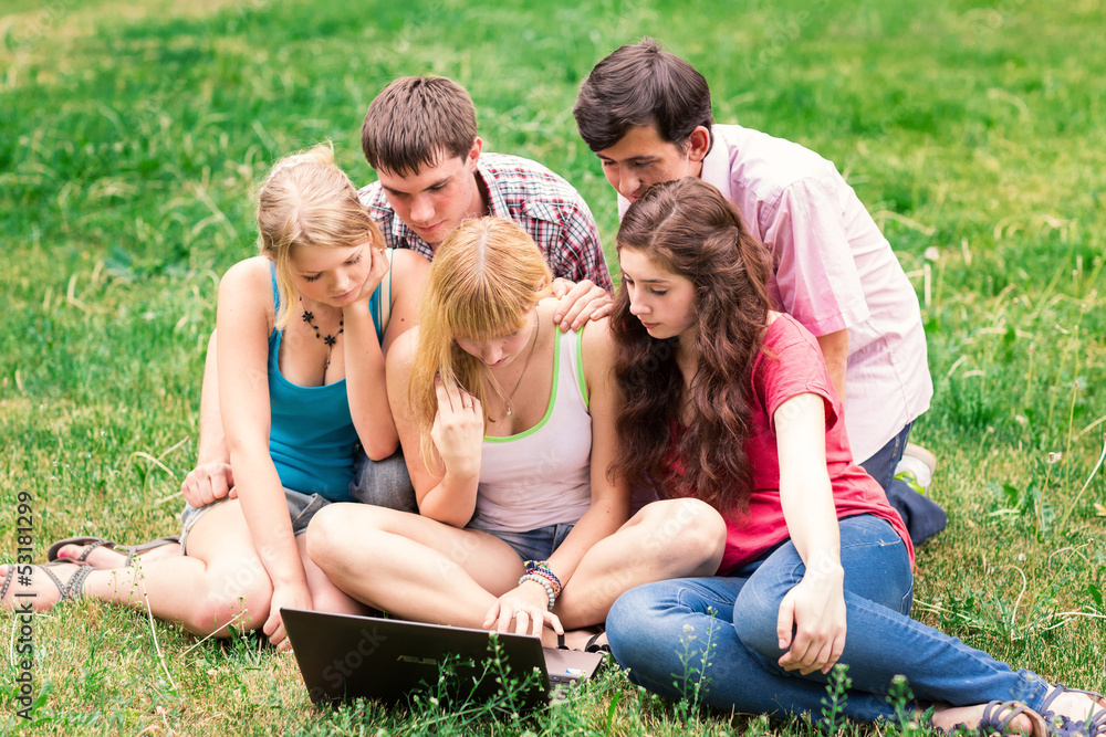 Group of happy smiling Teenage Students Outside College
