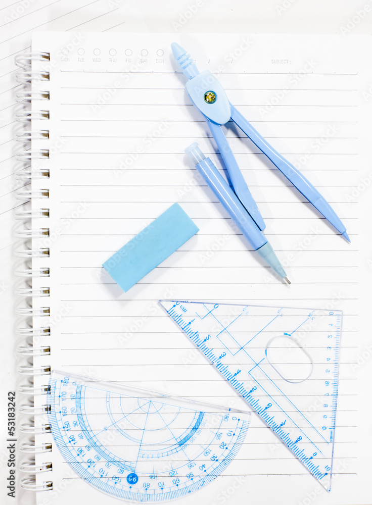 School supply set isolated on notebook School supply set isolated on notebook