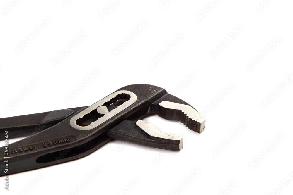Adjustable wrench isolated on the white background. Adjustable wrench isolated on the white background.