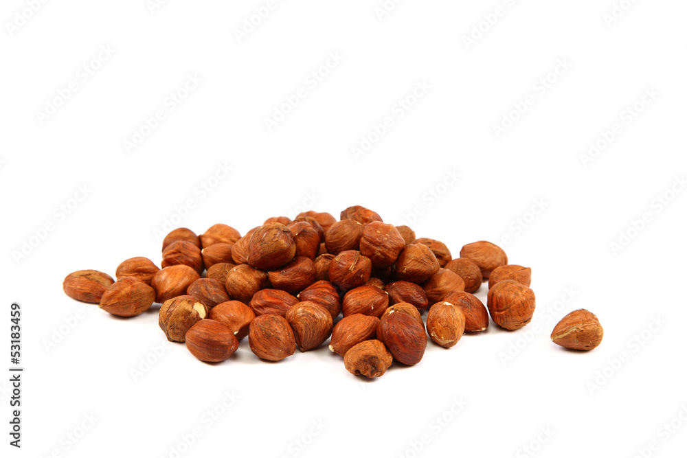 Handful hazelnuts isolated on the white background. Handful hazelnuts isolated on the white background.