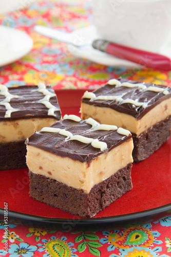 Brownies with peanuts and chocolate.