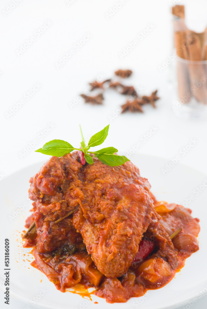 curry rendang chicken, indian cuisine with traditional food item curry rendang chicken, indian cuisine with traditional food item
