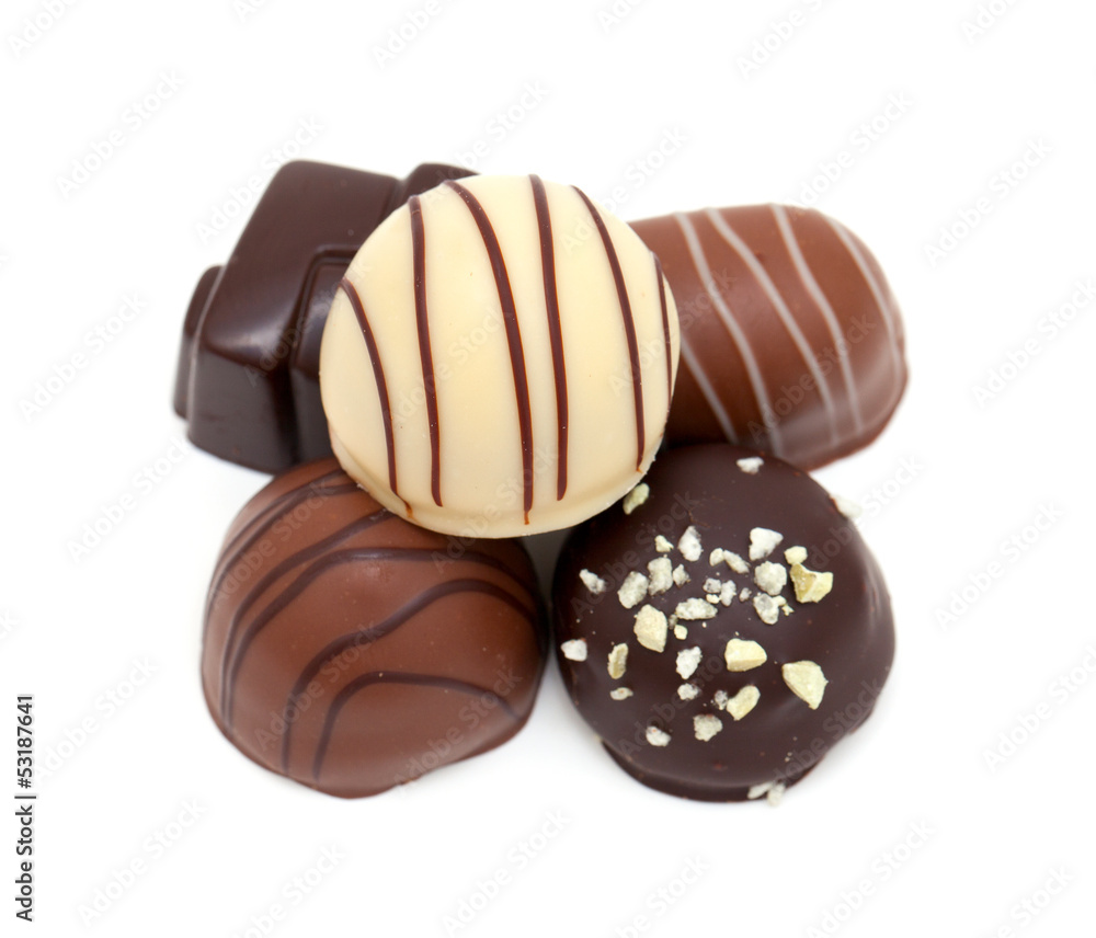 Fototapeta premium chocolate candies over white