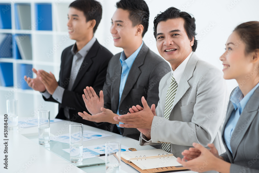 Applauding businessman Applauding businessman