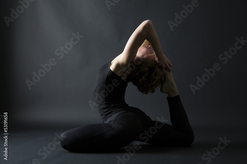 yoga posture ekapada raja kapotasana full pigeon pose side view