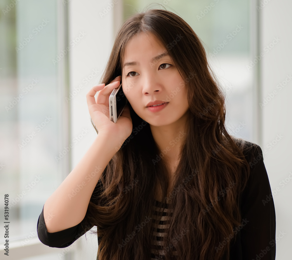 woman talking on a smartphone woman talking on a smartphone