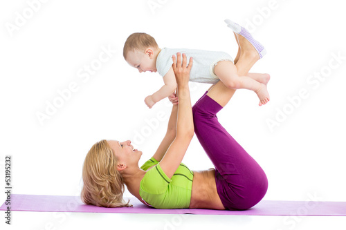 mother with baby doing gymnastics and fitness exercises