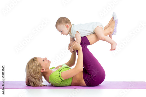 mother with baby doing gymn...