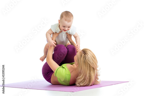 mother with baby doing gymn...