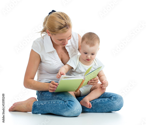 mother reading a book to he...