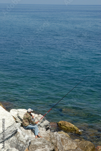 Pêcheur sur le port de Bastia