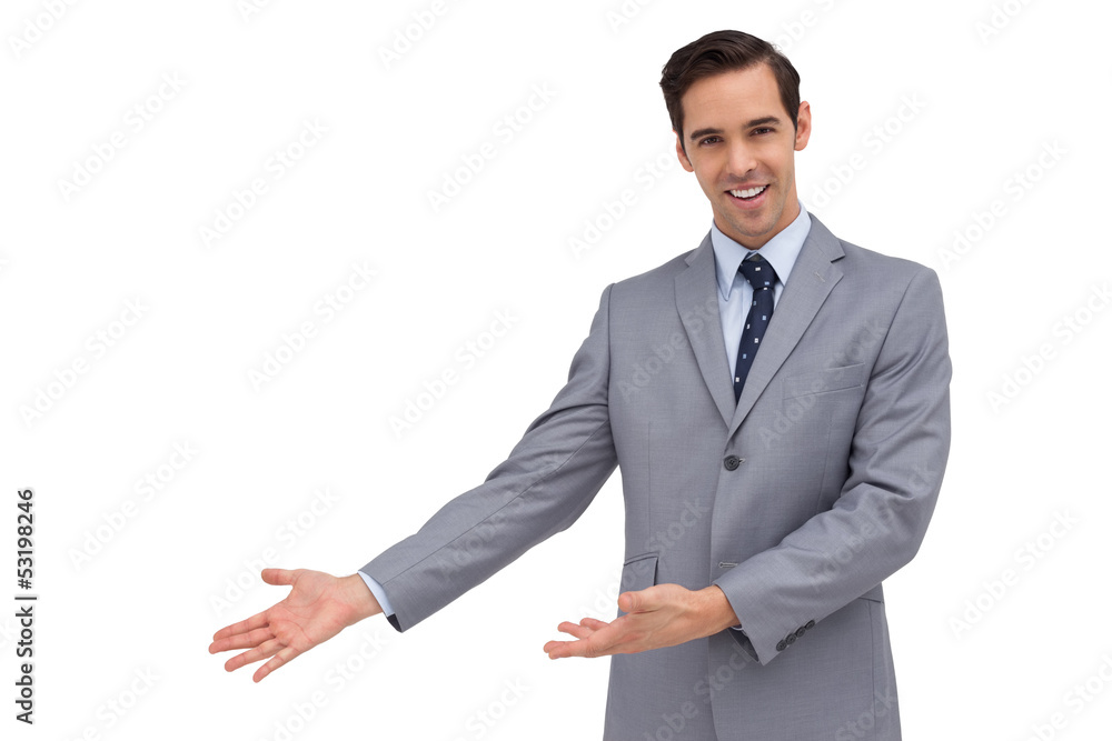 Smiling businessman giving a presentation with his hands Smiling businessman giving a presentation with his hands