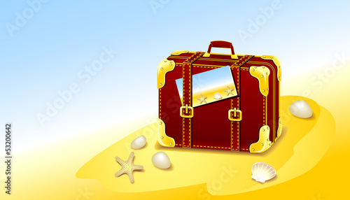 Suitcase for summer at the beach with shells starfish