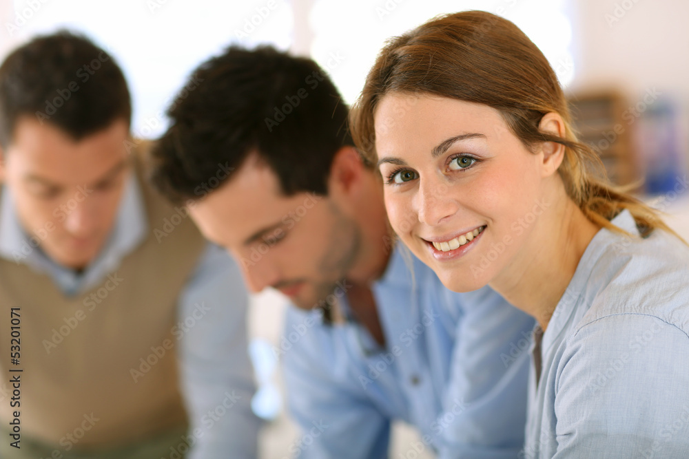 Portrait of young business girl in office Portrait of young business girl in office