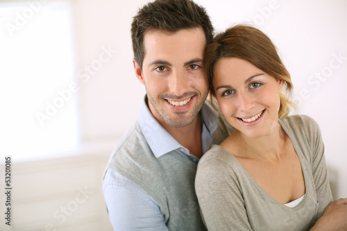 Portrait of smiling loving couple © goodluz