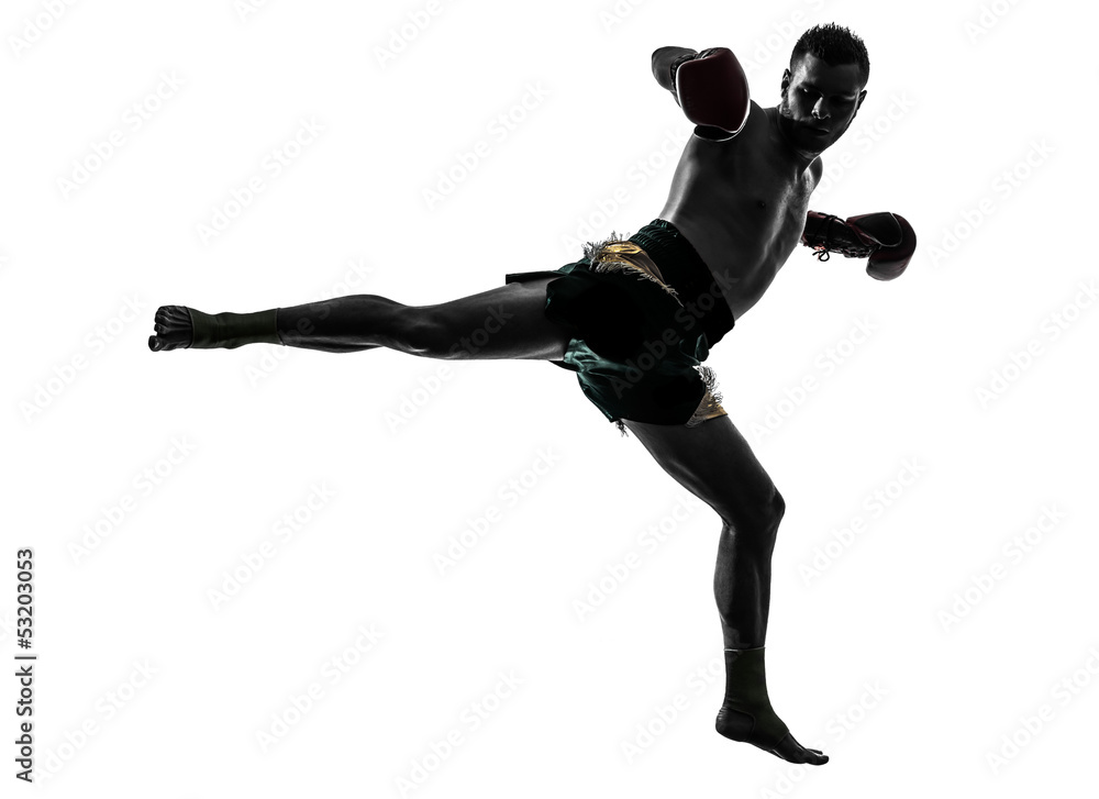 one man exercising thai boxing silhouette