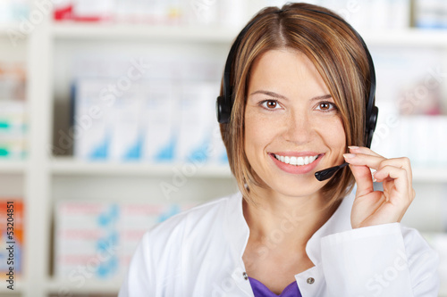 Chemist woman with headset