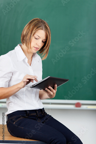 Teacher working on a tablet-pc