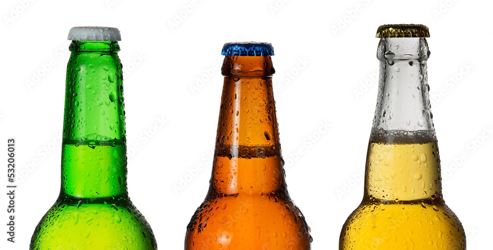 Row of three beer bottles in different colors isolated on white Row of three beer bottles in different colors isolated on white