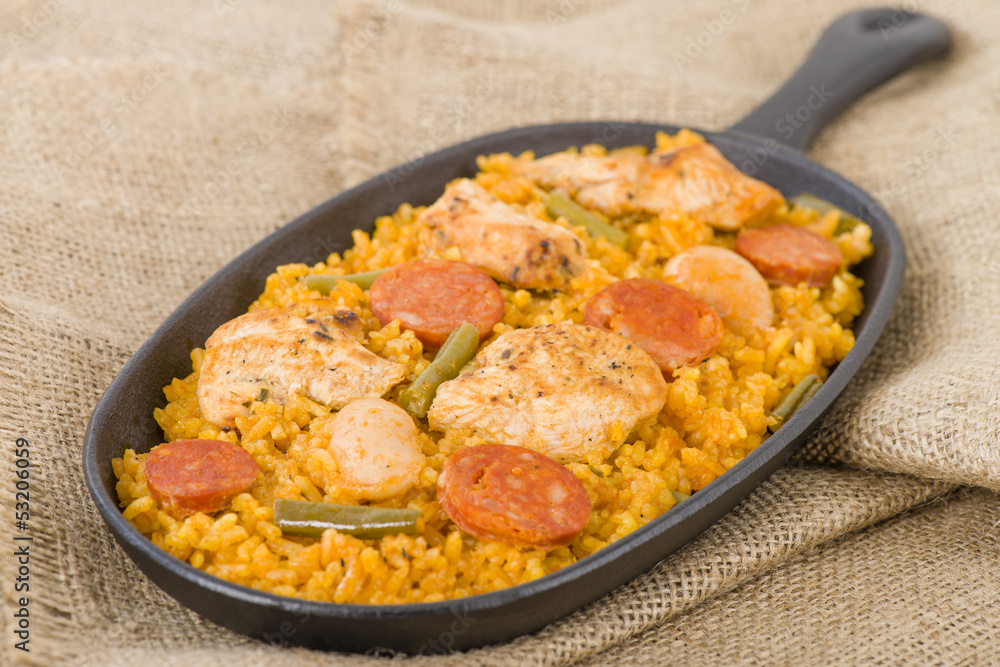 Paella Valenciana - Paella with chicken, sausage and vegetables