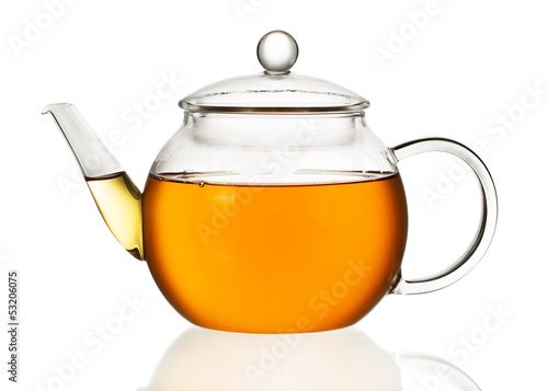 Teapot with tea isolated in white background