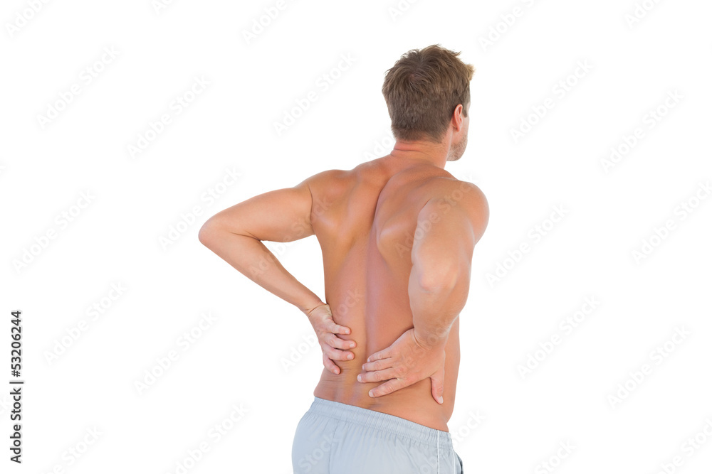 Shirtless man suffering from back pain
