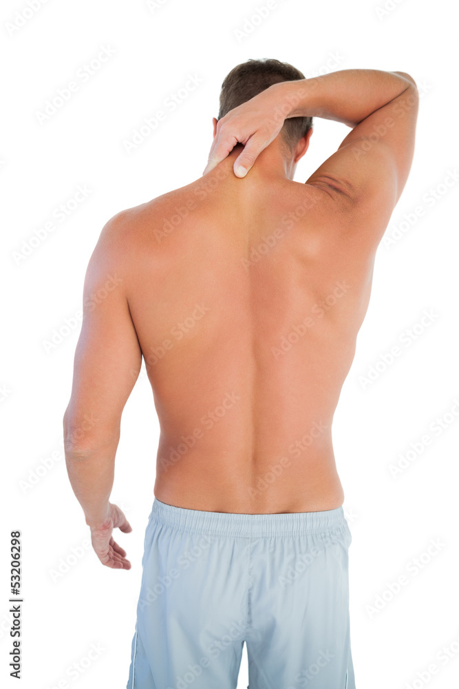Fototapeta premium Man wearing shorts having a neck ache