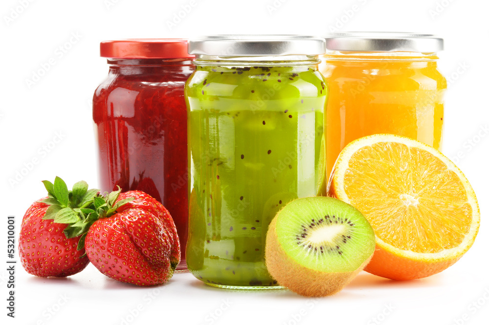 Composition with jars of fruity jams on white. Preserved fruits Composition with jars of fruity jams on white. Preserved fruits