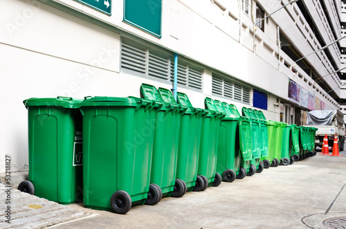 large green trash cans