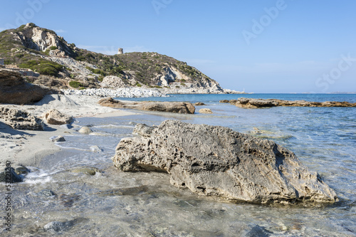 Sardinian Beach with an old Watchtower in the background