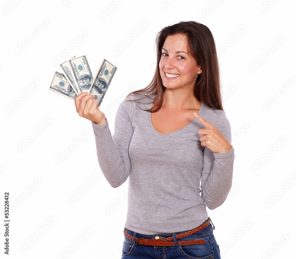 Lovely lady holding dollars while standing Lovely lady holding dollars while standing