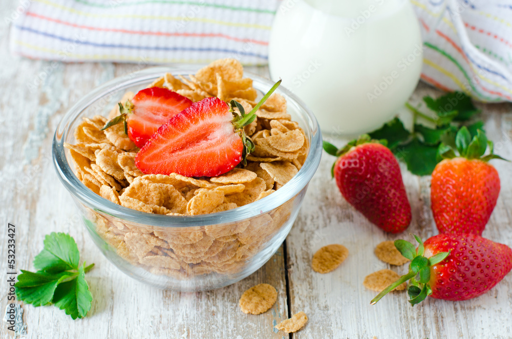 Corn flakes with strawberries , Breakfast . Corn flakes with strawberries , Breakfast .