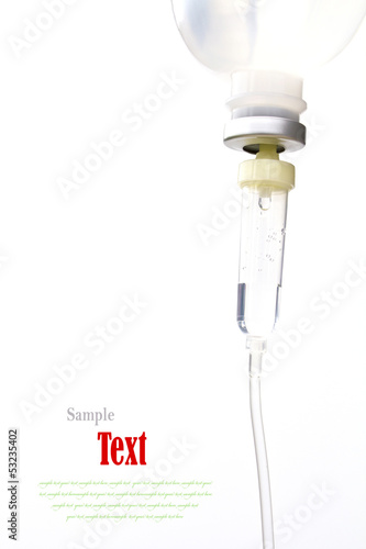 Infusion bottle with IV solution on white background with copy s photo