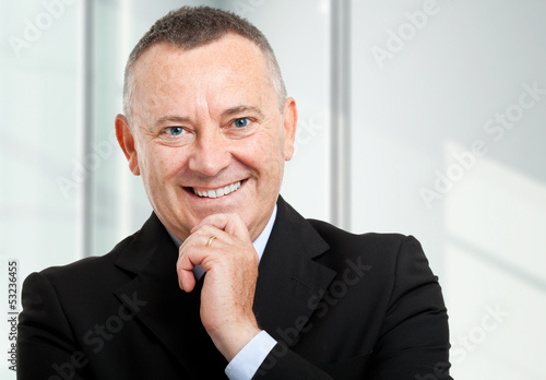 Smiling mature businessman portrait